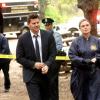 BONES:  Booth (David Boreanaz, L) and Brennan (Emily Deschanel, R) arrive at a crime scene in the "The Big Beef At The Royal Diner" episode of BONES airing Thursday, April 30 (8:00-9:00 PM ET/PT) on FOX.  ©2015 Fox Broadcasting Co. Cr: Patrick McElhenney/FOX