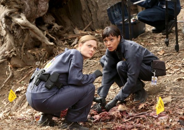 BONES:  Brennan (Emily Deschanel, L) and Cam (Tamara Taylor, R) collect evidence at a crime scene in the "The Big Beef At The Royal Diner" episode of BONES airing Thursday, April 30 (8:00-9:00 PM ET/PT) on FOX.  ©2015 Fox Broadcasting Co. Cr: Patrick McElhenney/FOX