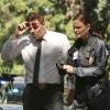 BONES:  Brennan (Emily Deschanel, R) and Booth (David Boreanaz, L) investigate a murder tied to the world of illegal animal trafficking in the "The Tiger in the Tale" episode of BONES airing Monday, Oct. 8 (8:00-9:00 PM ET/PT) on FOX.  ©2012 Fox Broadcasting Co.  Cr:  Patrick McElhenney/FOX