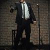 BONES:  Booth (David Boreanaz) takes the stage when he investigates the murder of a comedian in the &quot;The But in the Joke&quot; episode of BONES airing Monday, Nov. 26 (8:00-9:00 PM ET/PT) on FOX.  &#xa9;2012 Fox Broadcasting Co.  Cr:  Ray Mickshaw/FOX