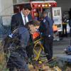 BONES:  Brennan (Emily Deschanel, R) and Booth (David Boreanaz, L) investigate remains that end up attached to a graffiti artist after he falls from an installation location in the &quot;The But in the Joke&quot; episode of BONES airing Monday, Nov. 26 (8:00-9:00 PM ET/PT) on FOX.  &#xa9;2012 Fox Broadcasting Co.  Cr:  Ray Mickshaw/FOX