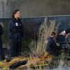 BONES:  Brennan (Emily Deschanel, L) and Booth (David Boreanaz, R) investigate remains that end up attached to a graffiti artist after he falls from an installation location in the &quot;The But in the Joke&quot; episode of BONES airing Monday, Nov. 26 (8:00-9:00 PM ET/PT) on FOX.  &#xa9;2012 Fox Broadcasting Co.  Cr:  Ray Mickshaw/FOX