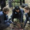 BONES:  Brennan (Emily Deschanel, R), Cam (Tamara Taylor, C) and Hodgins (TJ Thyne, L) investigate the remains of two bodies that were found at the same burial plot in the &quot;The Twist in the Plot&quot; episode of BONES airing Monday, Jan. 28 (8:00-9:00 PM ET/PT) on FOX.  &#xa9;2013 Fox Broadcasting Co.  CR:  Patrick McElhenney/FOX