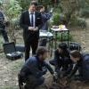BONES:  Booth (David Boreanaz, L) watches as Brennan (Emily Deschanel, R), Cam (Tamara Taylor, second from R) and Hodgins (TJ Thyne, second from L) investigate the remains of two bodies that were found at the same burial plot in the &quot;The Twist in the Plot&quot; episode of BONES airing Monday, Jan. 28 (8:00-9:00 PM ET/PT) on FOX.  &#xa9;2013 Fox Broadcasting Co.  CR:  Patrick McElhenney/FOX