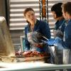 BONES:  L-R:  Brennan (Emily Deschanel), Cam (Tamara Taylor) and Hodgins (TJ Thyne) investigate remains found in a suitcase in the "The Friend in Need" episode of BONES airing Monday, Feb. 18 (8:00-9:00 PM ET/PT) on FOX.  ©2013 Fox Broadcasting Co. Cr: John Johnson/FOX