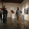 BONES:  With hopes of finding a lead to the murderer in their case, Booth (David Boreanaz, L), Brennan (Emily Deschanel, second from L) and Brima Chalobah (guest star Kareem Grimes, R) view photographs at Kimberly Singer's (guest star Annie Fitzgerald, second from R) gallery that depict chilling images from Brima's childhood in Sierra Leone in the &quot;The Survivor in the Soap&quot; episode of BONES airing Monday, March 4 (8:00-9:00 PM ET/PT) on FOX.  &#xa9;2013 Jordin Althaus/FOX
