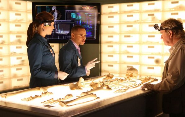 BONES: Brennan (Emily Deschanel, L) and Dr. Clark Edison (guest star Eugene Byrd, C) to participate in a documentary to raise funds for The Jeffersonian in the "The Blood from the Stones" episode of BONES airing Monday, March 25 (8:00-9:00 PM ET/PT) on FOX. Also pictured: Guest star Dave Thomas, R. ©2013 Fox Broadcasting Co. Cr: Patrick McElhenney/FOX BONES: Brennan (Emily Deschanel, L) and Dr. Clark Edison (guest star Eugene Byrd, C) to participate in a documentary to raise funds for The Jeffersonian in the "The Blood from the Stones" episode of BONES airing Monday, March 25 (8:00-9:00 PM ET/PT) on FOX. Also pictured: Guest star Dave Thomas, R. ©2013 Fox Broadcasting Co. Cr: Patrick McElhenney/FOX