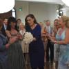 BONES:  Brennan (Emily Deschanel, second from R) catches the bouquet at Booth's mother's wedding in the &quot;The Party in the Pants&quot; episode of BONES airing Monday, April 15 (8:00-9:00 PM ET/PT) on FOX. &#xa9;2013 Fox Broadcasting Co.  Cr:  Richard Foreman/FOX