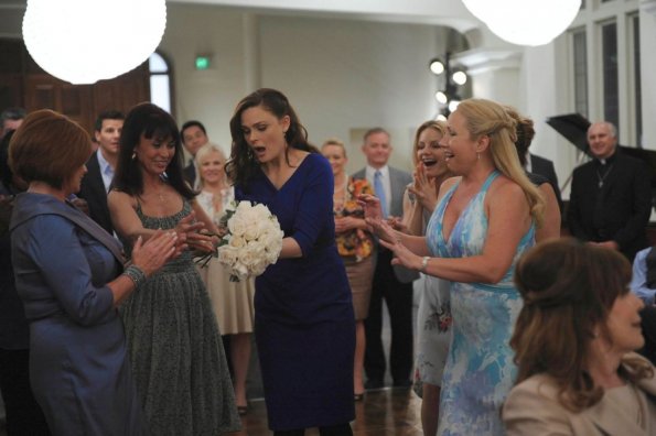 BONES: Brennan (Emily Deschanel, second from R) catches the bouquet at Booth's mother's wedding in the "The Party in the Pants" episode of BONES airing Monday, April 15 (8:00-9:00 PM ET/PT) on FOX. ©2013 Fox Broadcasting Co. Cr: Richard Foreman/FOX BONES: Brennan (Emily Deschanel, second from R) catches the bouquet at Booth's mother's wedding in the "The Party in the Pants" episode of BONES airing Monday, April 15 (8:00-9:00 PM ET/PT) on FOX. ©2013 Fox Broadcasting Co. Cr: Richard Foreman/FOX