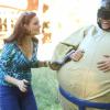 BONES:  Brennan (Emily Deschanel, L) and Booth (David Boreanaz, C) go undercover at a marriage retreat as previous personas "Roxie" and "Tony"  in the "The Cheat in the Retreat" episode of BONES airing Monday, Sept. 23 (8:00-9:00 PM ET/PT) on FOX.  ©2013 Fox Broadcasting Co.  Cr:  Patrick McElhenney/FOX
