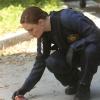 BONES:  Brennan (Emily Deschanel) investigates remains that were found being eaten by bobcats in the &quot;The Cheat in the Retreat&quot; episode of BONES airing Monday, Sept. 23 (8:00-9:00 PM ET/PT) on FOX.  &#xa9;2013 Fox Broadcasting Co.  Cr:  Patrick McElhenney/FOX  &#xa9;2013 Fox Broadcasting Co.  Cr:  Patrick McElhenney/FOX