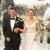 BONES:  Brennan (Emily Deschanel, R) and Booth (David Boreanaz, L) at their wedding in the &quot;The Woman in White&quot; episode of BONES airing Monday, Oct. 21 (8:00-9:00 PM ET/PT) on FOX.  Also pictured background L-R: guest star Ty Panitz, guest star Mather Zickel and Michaela Conlin.  &#xa9;2013 Fox Broadcasting Co.  Cr:  Patrick McElhenney/FOX
