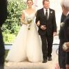 BONES:  Max (guest star Ryan O'Neal, R) walks Brennan (Emily Deschanel, L) down the aisle at her wedding in the "The Woman in White" episode of BONES airing Monday, Oct. 21 (8:00-9:00 PM ET/PT) on FOX.  ©2013 Fox Broadcasting Co.  Cr:  Patrick McElhenney/FOX