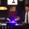 BONES:  Brennan (Emily Deschanel, L) and Booth (David Boreanaz, R) investigate evidence found at a bar in the "Big in the Philippines" episode of BONES airing Friday, Jan. 17 (8:00-9:00 PM ET/PT) on FOX.  ©2013 Fox Broadcasting Co.  Cr:  Patrick McElhenney/FOX