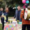 BONES:  Brennan (Emily Deschanel, second from L) and Max (guest star Ryan O'Neal, R) celebrate Christine's (guest star Sunnie Pelant, L) birthday in the &quot;The Carrot in the Kudzu&quot; episode of BONES airing Monday, March 24 (8:00-9:00 PM ET/PT) on FOX. &#xa9;2014 Fox Broadcasting Co.  Cr:  Patrick McElhenney/FOX