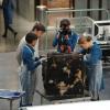 BONES:  L-R:  Cam (Tamara Taylor),  Jeffersonian intern Colin Fisher (guest star Joel David Moore), Angela (Michaela Conlin) and Brennan (Emily Deschanel) examine remains that have been burned into a recliner in the &quot;The Recluse in the Recliner&quot; Season Finale episode of BONES airing Monday, May 19 (8:00-9:00 PM ET/PT) on FOX.  &#xa9;2014 Fox Broadcasting Co.  Cr:  Ray Mickshaw/FOX