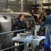 BONES:  Hodgins (TJ Thyne, L) and Cam (Tamara Taylor, R) examine remains that have been found burned inside an airstream trailer in the &quot;The Recluse in the Recliner&quot; Season Finale episode of BONES airing Monday, May 19 (8:00-9:00 PM ET/PT) on FOX.  &#xa9;2014 Fox Broadcasting Co.  Cr:  Ray Mickshaw/FOX