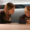 BONES:  Brennan (Emily Deschanel, L) connects with a boy (Paul Butcher, R) who might have information about a missing child found dead in the woods in the BONES episode "A Boy in the Bush" airing Tuesday, Nov. 8 (8:00-9:00 PM ET/PT) on FOX.  ™©2005 Fox Broadcasting Co.  Cr:  Carin Baer/FOX.
