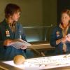 BONES:  Brennan (Emily Deschanel, R) and her assistant Zach (Eric Millegan, L) examine the bones of a missing child found dead in the woods in the BONES episode "A Boy in the Bush" airing Tuesday, Nov. 8 (8:00-9:00 PM ET/PT) on FOX.  ™©2005 Fox Broadcasting Co.  Cr:  Carin Baer/FOX.
