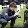 BONES:  Zach (Eric Millegan) gathers evidence from a murder scene in Arlington Cemetery in the BONES episode "The Soldier on the Grave" airing Wednesday, May 10 (8:00-9:00 PM ET/PT) on FOX.  ©2006 Fox Broadcasting Co.  Cr:  Carin Baer/FOX