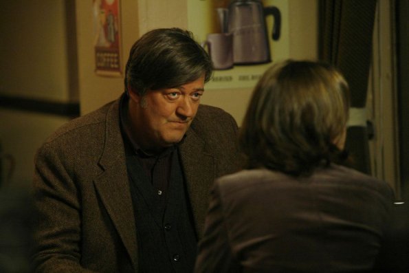 BONES: Dr. Wyatt (guest star Stephen Fry) helps Booth and Brennan in the BONES episode "Priest in the Churchyard" airing Wednesday, March 28 (8:00-9:00 PM ET/PT) on FOX. ©2007 Fox Broadcasting Co. Cr: Isabella Vosmikova/FOX BONES: Dr. Wyatt (guest star Stephen Fry) helps Booth and Brennan in the BONES episode "Priest in the Churchyard" airing Wednesday, March 28 (8:00-9:00 PM ET/PT) on FOX. ©2007 Fox Broadcasting Co. Cr: Isabella Vosmikova/FOX