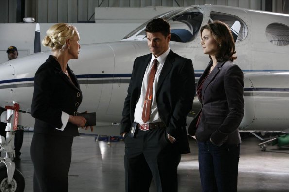 BONES: Booth (David Boreanaz, C) and Brennan (Emily Deschanel, R) search an airplane they think may be a crime scene in the BONES episode "Spaceman in a Crater" airing Wednesday, May 2 (8:00-9:00 PM ET/PT) on FOX. Also pictured: Andrea Thompson as Nina Sanborn (L). BONES: Booth (David Boreanaz, C) and Brennan (Emily Deschanel, R) search an airplane they think may be a crime scene in the BONES episode "Spaceman in a Crater" airing Wednesday, May 2 (8:00-9:00 PM ET/PT) on FOX. Also pictured: Andrea Thompson as Nina Sanborn (L).