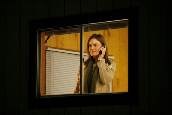BONES: Brennan (Emily Deschanel) gets a surprise phone call from Booth on Christmas Eve in the BONES episode "The Santa in the Slush" airing Tuesday, Nov. 27 (8:00-9:00 PM ET/PT) on FOX. ©2007 Fox Broadcasting Co. Cr: Isabella Vosmikova/FOX BONES: Brennan (Emily Deschanel) gets a surprise phone call from Booth on Christmas Eve in the BONES episode "The Santa in the Slush" airing Tuesday, Nov. 27 (8:00-9:00 PM ET/PT) on FOX. ©2007 Fox Broadcasting Co. Cr: Isabella Vosmikova/FOX