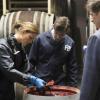 BONES:  Brennan (Emily Deschanel, L) fishes parts of a decomposed body out of a wine cask at a vineyard in the BONES episode &quot;The Critic in the Cabernet&quot; airing Thursday, May 7 (8:00-9:00 PM ET/PT) on FOX.  Also pictured:  David Greenman (C) and Jeff Yagher (R).  &#xa9;2009 Fox Broadcasting Co.  Cr:  Richard Foreman/FOX