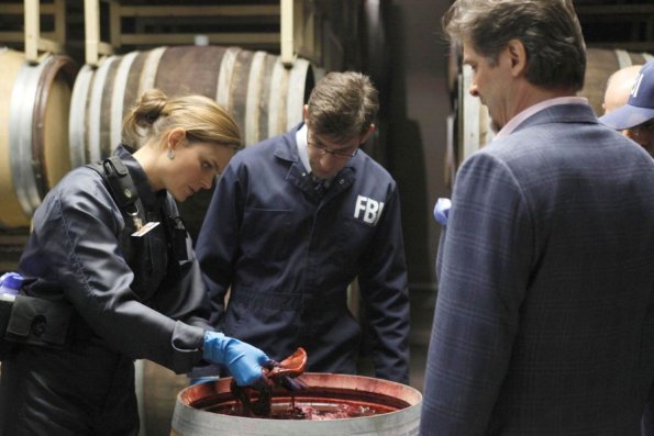 BONES:  Brennan (Emily Deschanel, L) fishes parts of a decomposed body out of a wine cask at a vineyard in the BONES episode &quot;The Critic in the Cabernet&quot; airing Thursday, May 7 (8:00-9:00 PM ET/PT) on FOX.  Also pictured:  David Greenman (C) and Jeff Yagher (R).  &#xa9;2009 Fox Broadcasting Co.  Cr:  Richard Foreman/FOX