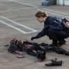 BONES:  Brennan (Emily Deschanel) examines a body at a crime scene in the BONES episode &quot;The Bond in the Boot&quot; airing Thursday, Sept. 24 (8:00-9:00 PM ET/PT) on FOX.  &#xa9;2009 Fox Broadcasting Co.  Cr:  Greg Gayne/FOX