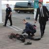 BONES:  During their examination of a body at a crime scene, Booth (David Boreanaz, R) and Brennan (Emily Deschanel, L) discover new evidence in the BONES episode &quot;The Bond in the Boot&quot; airing Thursday, Sept. 24 (8:00-9:00 PM ET/PT) on FOX.  &#xa9;2009 Fox Broadcasting Co.  Cr:  Greg Gayne/FOX