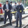 BONES:  Brennan (Emily Deschanel, R) and Booth (David Boreanaz, L) examine the remains of a young man whose body is found dismembered along a train track in the BONES episode &quot;The Plain in the Prodigy&quot; airing Thursday, Oct. 1 (8:00-9:00 PM ET/PT) on FOX.  &#xa9;2009 Fox Broadcasting Co.  Cr:  Greg Gayne/FOX