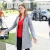 BONES:  Brennan (Emily Deschanel, L) and Booth (David Boreanaz, R) interview a group of neighbors in the BONES episode &quot;The Beautiful Day in the Neighborhood&quot; airing Thursday, Oct. 8 (8:00-9:00 PM ET/PT) on FOX.  &#xa9;2009 Fox Broadcast Company.  Cr:  Greg Gayne/FOX