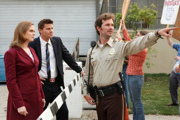 BONES:  Brennan (Emily Deschanel, L) and Booth (David Boreanaz, C) investigate a local chicken factory when the body of of a chicken farmer is found mutilated on a river bank in the BONES episode &quot;The Tough Man in the Tender Chicken&quot; airing Thursday, Nov. 5 (8:00-9:00 PM ET/PT) on FOX.  Also pictured:  Sean Bridgers (R).   &#xa9;2009 Fox Broadcasting Co.  Cr:  Greg Gayne/FOX