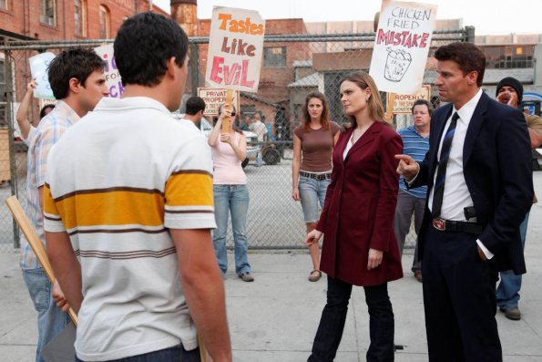 BONES:  Brennan (Emily Deschanel, second from R) and Booth (David Boreanaz, R) investigate a local chicken factory when the body of of a chicken farmer is found mutilated on a river bank in the BONES episode &quot;The Tough Man in the Tender Chicken&quot; airing Thursday, Nov. 5 (8:00-9:00 PM ET/PT) on FOX.  &#xa9;2009 Fox Broadcasting Co.  Cr:  Greg Gayne/FOX