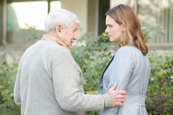 BONES:  Brennan (Emily Descanel, R) shares a private conversation with Booth's grandfather Hank (guest star Ralph Waite, L) in the BONES episode &quot;The Foot in the Foreclosure&quot; airing Thursday, Nov. 19 (8:00-9:00 PM ET/PT) on FOX.  &#xa9;2009 Fox Broadcasting Co.  Cr:  Greg Gayne/FOX