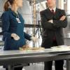 BONES:  Brennan (Emily Deschanel, L) and FBI Agent Andrew Hacker (guest star Diedrich Bader, R) discuss a case in the BONES episode &quot;The Predator in the Pool&quot; airing Thursday, April 22 (8:00-9:00 PM ET/PT) on FOX.  &#xa9;2010 Fox Broadcasting Co.  Cr:  Greg Gayne/FOX
