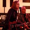 BONES:  Brennan (Emily Deschanel) performs on stage when she and Booth investigate the death of a rich adventure seeker, and are lead to a rock-n-roll fantasy camp in the BONES episode &quot;The Rocker in the Rinse Cycle&quot; airing Thursday, April 29 (8:00-9:00 PM ET/PT) on FOX.  &quot;FOX Rocks&quot; week is a week of music-themed programming beginning Thursday, april 29 and airing through Wednesday, May 5.  &#xa9;2010 Fox Broadcasting Co.  Cr:  Greg Gayne/FOX