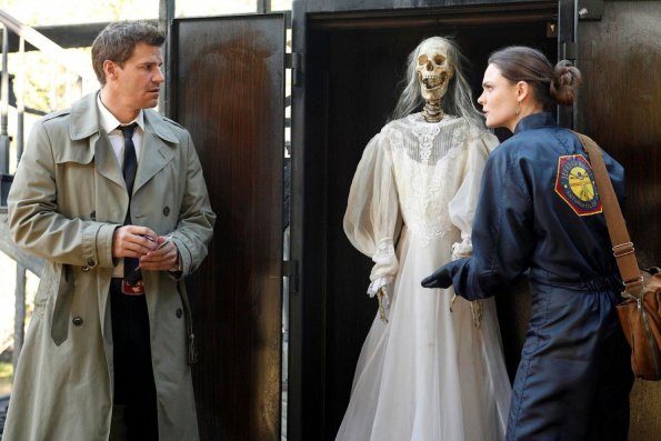 BONES: Booth (David Boreanaz, L) and Brennan (Emily Deschanel, R) examine a skeleton found at the scene of a fire in the BONES episode "The Witch in the Wardrobe" airing Thursday, May 6 (8:00-9:00 PM ET/PT) on FOX. ©2010 Fox Broadcasting Co. Cr: Greg Gayne/FOX BONES: Booth (David Boreanaz, L) and Brennan (Emily Deschanel, R) examine a skeleton found at the scene of a fire in the BONES episode "The Witch in the Wardrobe" airing Thursday, May 6 (8:00-9:00 PM ET/PT) on FOX. ©2010 Fox Broadcasting Co. Cr: Greg Gayne/FOX
