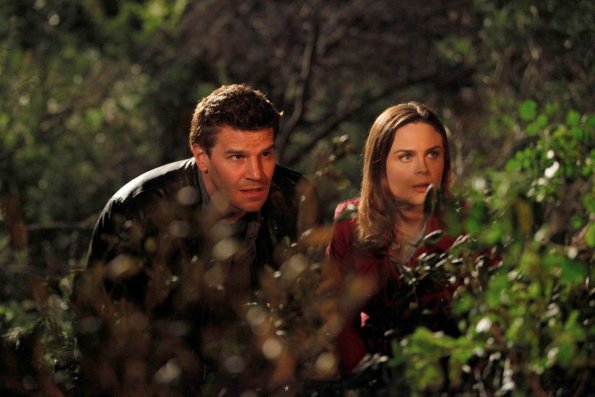 BONES: Booth (David Boreanaz, L) and Brennan (Emily Deschanel, R) observe a Wiccan ritual in the BONES episode "The Witch in the Wardrobe" airing Thursday, May 6 (8:00-9:00 PM ET/PT) on FOX. ©2010 Fox Broadcasting Co. Cr: Greg Gayne/FOX BONES: Booth (David Boreanaz, L) and Brennan (Emily Deschanel, R) observe a Wiccan ritual in the BONES episode "The Witch in the Wardrobe" airing Thursday, May 6 (8:00-9:00 PM ET/PT) on FOX. ©2010 Fox Broadcasting Co. Cr: Greg Gayne/FOX
