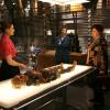 Caroline warns Hodgins and Brennan not to touch the evidence.