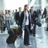 Brennan sees Booth from across the crowded airport.