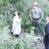 BONES:  Brennan (Emily Deschanel, L) and Booth (David Boreanaz, R) look for clues at a national park in the BONES episode &quot;The Couple in the Cave&quot; airing Thursday, Sept. 30 (8:00-9:00 PM ET/PT) on FOX.  Also Pictured:  Scott-Michael Campbell (C).  &#xa9;2010 Fox Broadcasting Co.  Cr:  Adam Taylor/FOX