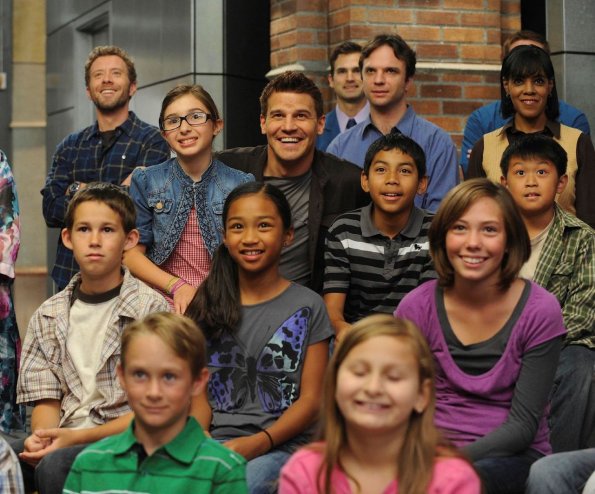 BONES: Booth (David Boreanaz, C) and Hodgins (TJ Thyne, L) watch as Brennan appears as a guest on a children's science show "The Body in the Bounty" episode of BONES airing Thursday, Oct. 14 (8:00-9:00 PM ET/PT) on FOX. ©2010 Fox Broadcasting Co. Cr: Ray Mickshaw/FOX BONES: Booth (David Boreanaz, C) and Hodgins (TJ Thyne, L) watch as Brennan appears as a guest on a children's science show "The Body in the Bounty" episode of BONES airing Thursday, Oct. 14 (8:00-9:00 PM ET/PT) on FOX. ©2010 Fox Broadcasting Co. Cr: Ray Mickshaw/FOX
