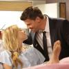 Hannah and Booth steal a kiss before Brennan comes in.