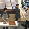 BONES:  Brennan (Emily Deschanel, C), Cam (Tamara Taylor, L) and Jeffersonian &quot;squintern&quot; Vincent Nigel-Murray (Ryan Cartwright, R) investigate human remains found in the world's largest chocolate bar in &quot;The Babe In The Bar&quot; episode of BONES airing Thursday, Nov. 18 (8:00-9:00 PM ET/PT) on FOX.  &#xa9;2010 Fox Broadcasting Co.  Cr:  Michael Yarish/FOX