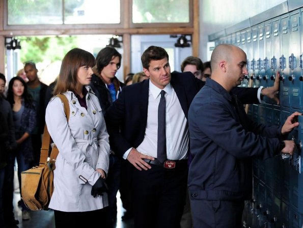 BONES: Clues lead Brennan (Emily Deschanel, L) and Booth (David Boreanaz, R) to a high school when they investigate a case where a human carcass has melted into the dashboard of a charred truck in "The Twisted Bones In The Melted Truck" episode of BONES airing Thursday, Dec. 2 (8:00-9:00 PM ET/PT) on FOX. ©2010 Fox Broadcasting Co. Cr: Adam Taylor/FOX BONES: Clues lead Brennan (Emily Deschanel, L) and Booth (David Boreanaz, R) to a high school when they investigate a case where a human carcass has melted into the dashboard of a charred truck in "The Twisted Bones In The Melted Truck" episode of BONES airing Thursday, Dec. 2 (8:00-9:00 PM ET/PT) on FOX. ©2010 Fox Broadcasting Co. Cr: Adam Taylor/FOX