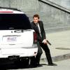 BONES:  Booth (David Boreanaz) searches the crowd to see who has fired at "The Gravedigger" as she arrives for her apppeal in "The Bullet in the Brain" episode of BONES airing Thursday,  Jan. 27 (9:00-10:00 PM ET/PT) on FOX.  ©2011 Fox Broadcasting Co.  Cr:  Ray Mickshaw/FOX