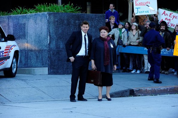 BONES: Booth (David Boreanaz, L) and AUSA Caroline Julian (Patricia Belcher, R) watch as "The Gravedigger" arrives to her appeal in "The Bullet in the Brain" episode of BONES airing Thursday, Jan. 27 (9:00-10:00 PM ET/PT) on FOX. ©2011 Fox Broadcasting Co. Cr: Ray Mickshaw/FOX BONES: Booth (David Boreanaz, L) and AUSA Caroline Julian (Patricia Belcher, R) watch as "The Gravedigger" arrives to her appeal in "The Bullet in the Brain" episode of BONES airing Thursday, Jan. 27 (9:00-10:00 PM ET/PT) on FOX. ©2011 Fox Broadcasting Co. Cr: Ray Mickshaw/FOX