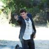 BONES:  Booth (David Boreanaz) aims at a suspect in "The Bullet in the Brain" episode of BONES airing Thursday,  Jan. 27 (9:00-10:00 PM ET/PT) on FOX.  ©2011 Fox Broadcasting Co.  Cr:  Ray Mickshaw/FOX